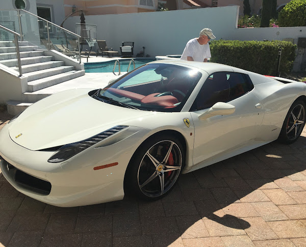 Chris Cox, Owner of Naples Mobile Detailing a Ferrari